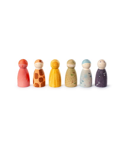 Set of colorful wooden peg dolls on a white background