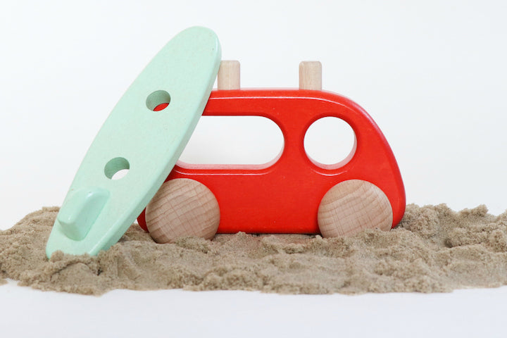Camper with Surfboard